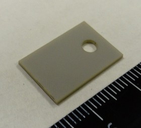 AlN KC304000-TO220.05N, Подложка керамическая теплопроводящая AlN 180 Вт/мК, 17кВ/мм для ТО-220 (0,5